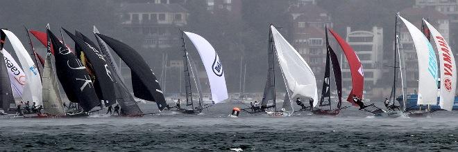 Action at the wing mark as the rain squall starts to hit - JJ Giltinan 18ft Skiff Championship © Frank Quealey /Australian 18 Footers League http://www.18footers.com.au